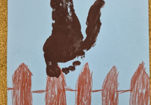 Praca plastyczna przedstawiająca czarnego kota