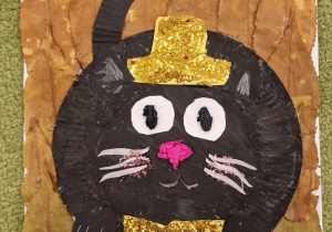 Praca plastyczna przedstawiająca czarnego kota