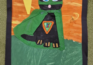 Praca plastyczna przedstawiająca czarnego kota