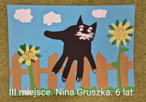 Praca plastyczna przedstawiająca czarnego kota